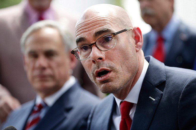  In this May 23, 2019, file photo, Texas House Speaker Dennis Bonnen, right, with Governor Greg Abbott, left, speaks at a news conference at the Texas Governor's Mansion in Austin, Texas. Bonnen called a female lawmaker "vile" and joked about a Democrat being gay in a secretly recorded meeting with a conservative activist. Bonnen also said in the tape released Tuesday, Oct. 15, 2019, that President Donald Trump "is killing us" in urban and suburban districts ahead of the 2020 elections. (AP Photo/Eric Gay, File)