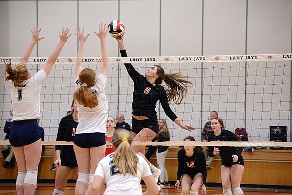 Annabelle Maassen of Jefferson City goes up at the net for a spike during Tuesday night's match against Helias at Fleming Fieldhouse.