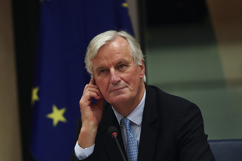 European Union chief Brexit negotiator Michel Barnier arrives to a Brexit Steering Group meeting at the European Parliament in Brussels, Wednesday, Oct. 16, 2019. (AP Photo/Francisco Seco)