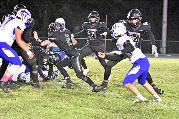 North Callaway senior quarterback Jadon Henry (2) looks for a hole to run through during the Thunderbirds' 28-22 Eastern Missouri Conference win against the Montgomery County Wildcats last Friday in Kingdom City.