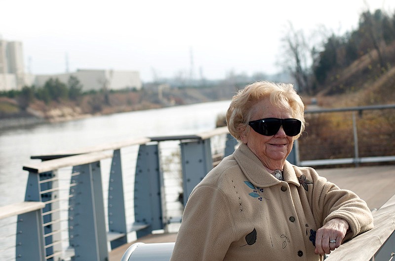 Dorlis Kurpis, the author's grandmother who recently passed away, loved to fish. Here, she is admiring Lake Michigan near Burns Ditch where she caught many yellow perch. 