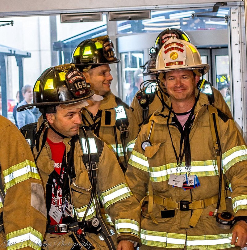 <p>Courtesy of Gail Hagans via Missouri Department of Public Safety</p><p>Chief Matt Schofield and firefighters James Noah and Matt Luebbert of the Jefferson City Fire Department participated in the Missouri Fire Marshal 9/11 Memorial Stair Climb on Saturday at the Jefferson State Office Building in Jefferson City.</p>