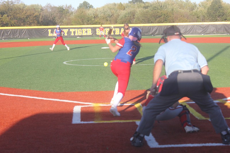 Camryn Schlup hits the ball back up the middle during the game vs Calvary Lutheran at District Oct. 17, 2019.