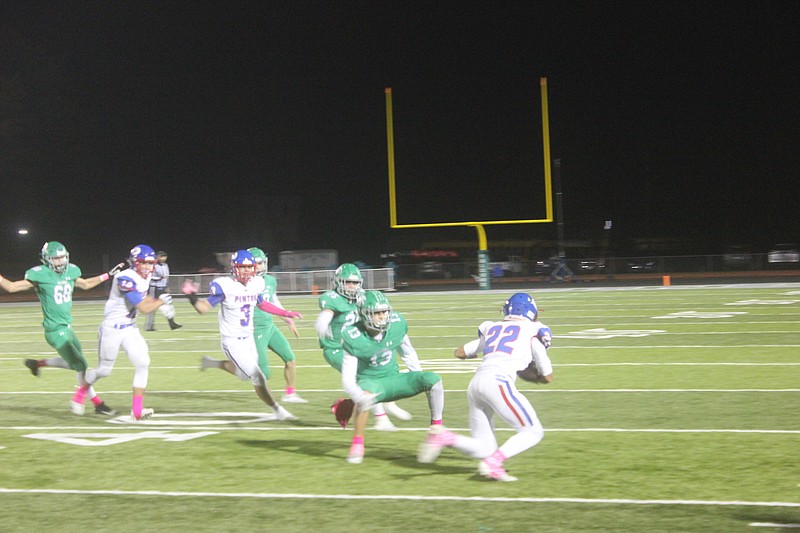 Drake Schlup tries to get away from defenders during the Pintos' game vs Blair Oaks Oct. 25, 2019.