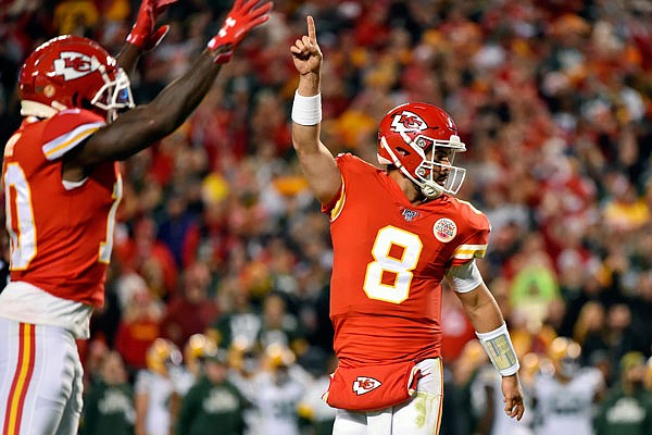 Chiefs quarterback Matt Moore celebrates during the second half of Sunday night's game against the Packers at Arrowhead Stadium.