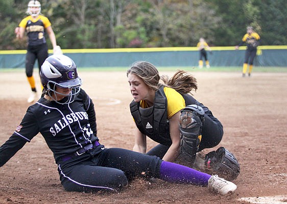 St. Elizabeth catcher Tori Kemna tags Salisbury courtesy runner Rachel Fessler before she reaches home plate during the sixth inning of Monday's Class 1 quarterfinal game at St. Elizabeth.