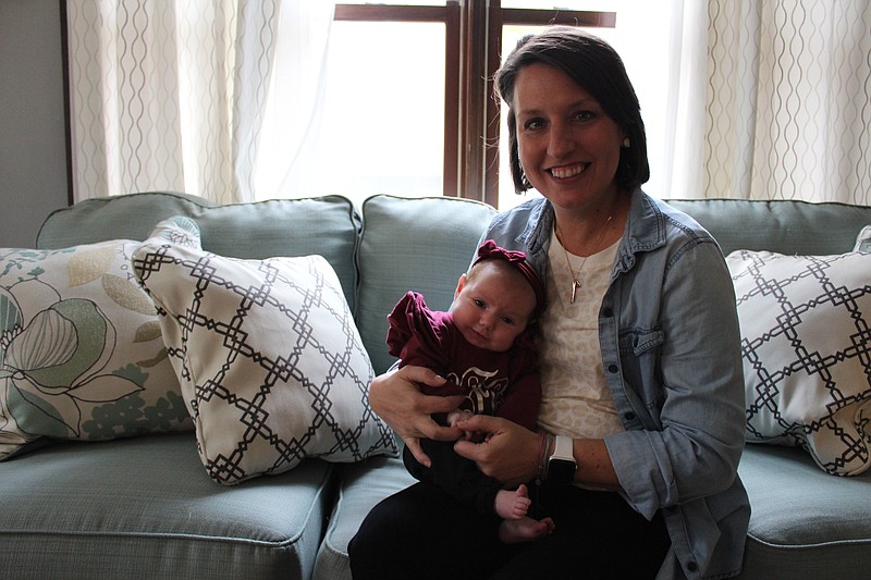 California native Danielle Farris and new daughter, Etta, 2 months old, are settling into a sense of normalcy following an up-and-down two years. Farris conquered cancer, only to be surprised with an earlier than planned pregnancy soon after.