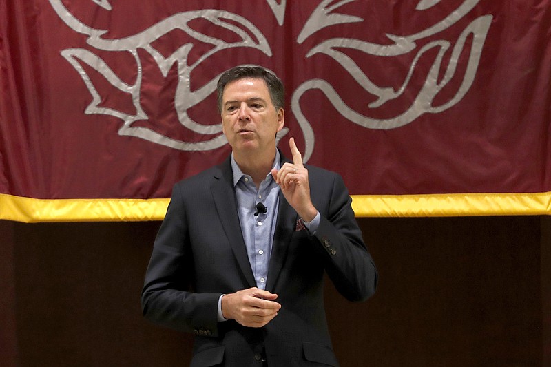 Former FBI director James Comey speaks at the University of Chicago Law School for the 2019 Ulysses and Marguerite Schwartz Memorial Lecture, Tuesday, Oct. 29, 2019, in Chicago. (AP Photo/Charles Rex Arbogast)