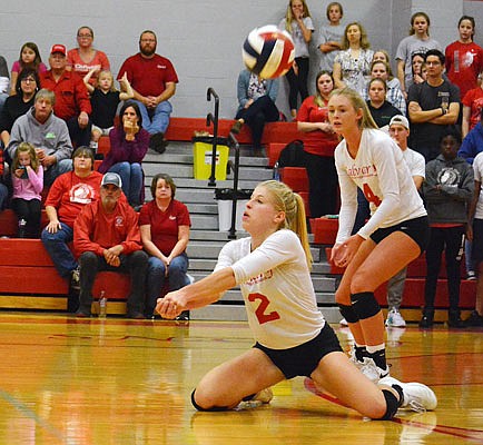 Sarah Johnson of Calvary Lutheran dives for the ball during Tuesday night's Class 1 District 12 championship match against Eugene at Calvary Lutheran.