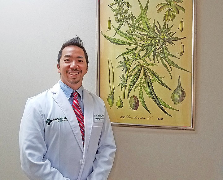 Dr. David Nguyen poses for a photo Wednesday at AR Cannabis Clinic on Jefferson Avenue in Texarkana, Ark. Nguyen founded the chain of clinics specializing in certifying Arkansas patients for medical marijuana use. Three locations have opened, and two more will within weeks. Nguyen plans to open a total of 12 locations across the state so no patient has to drive more than an hour to get to one. Staff photo by Karl Richter