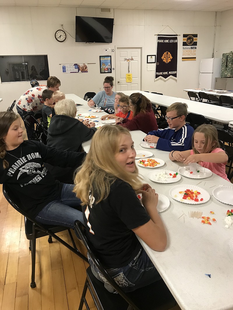 <p>Prairie Home held its Fall Reading Night on Oct. 10. Students listened to two Halloween stories and completed a STEM activity, where they created a house for a ghost using candy corn, gummy bears, marshmallows and toothpicks. At the end of the evening, all the students were able to pick out a free book to take home.</p>