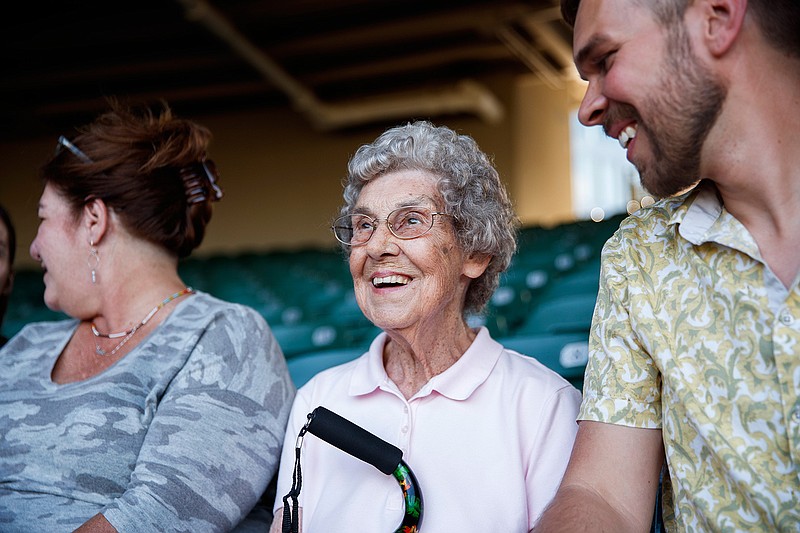 From center, Joy Ryan, 89, and her 38-year-old grandson Brad Ryan, right, tour Wrigley Field Wednesday Sept. 25, 2019 in Chicago. (Armando L. Sanchez/Chicago Tribune/TNS) 