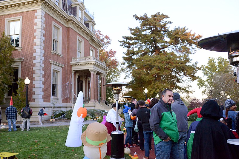 Missouri Lt. Gov. Mike Kehoe visits with children as they wait in line to meet Gov. Mike Parson and Fist Lady Teresa Thursday, Oct. 31, 2019, during the Trick-or-Treating at the People's House event at the Governor's Mansion in Jefferson City. The governor and first lady invited children and families for a kid-friendly, non-scary Halloween experience as children wore their favorite costumes and get their picture taken with them in front of the mansion. Children also received goody bags during the event as well as non-candy treat bag options for children with special dietary restrictions.