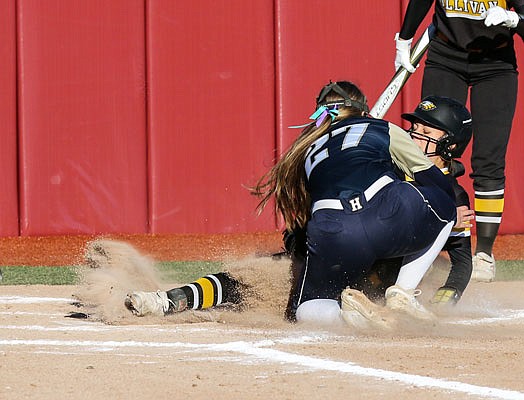 Helias pitcher Lauren Howell tags out Sullivan's Madyson Stahl at home plate during the third inning of Saturday's Class 3 state championship game at the Killian Softball Complex in Springfield.
