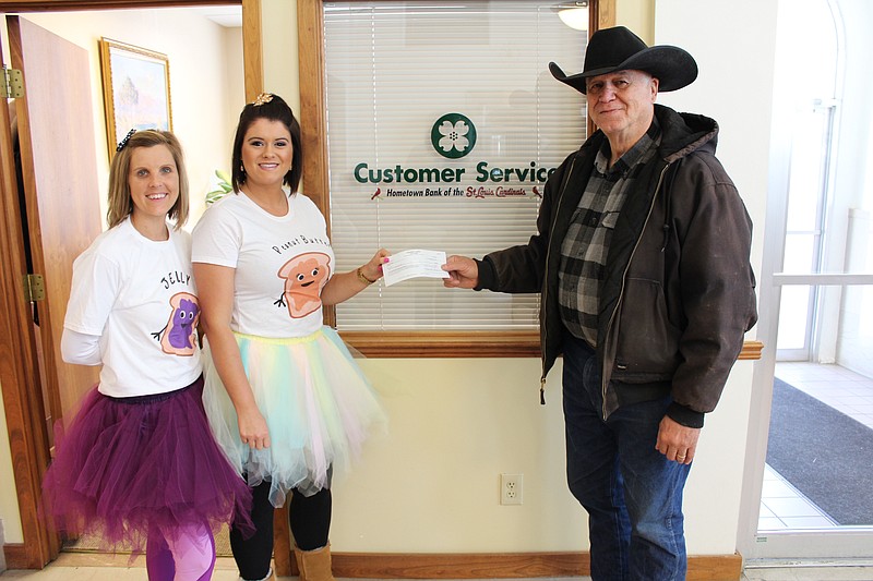Andrea Bondurant and Kaylee Porter, of Central Bank, presented Dan Mesey, Moniteau County Toys for Tots Program Coordinator, with a donation of $450 on Oct. 31, 2019.