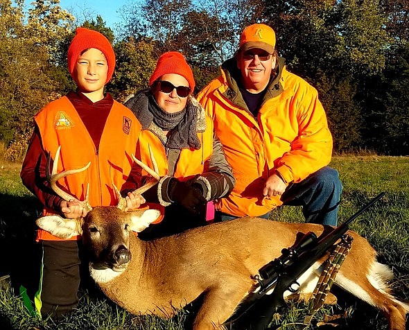 First-time deer hunter Troy Fox, left, took this buck during the early youth weekend Nov. 2-3. He is pictured with his mother, Meridithe Greene, and hunting mentor, Terry Pollard. Troy was one of seven young hunters who joined Missouri Department of Conservation staff and volunteers for hunting lessons in Columbia on Saturday followed by a mentored hunt.