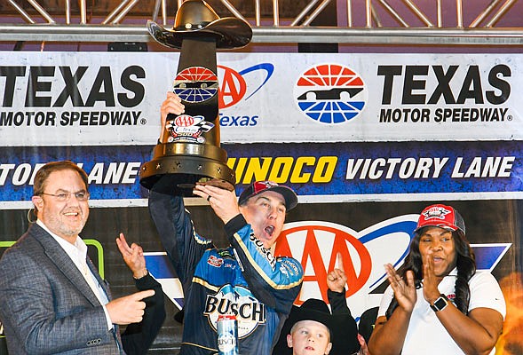 Kevin Harvick celebrates Sunday after winning a NASCAR Cup Series race at Texas Motor Speedway in Fort Worth, Texas.
