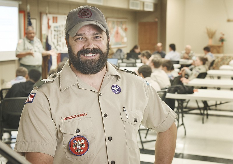 Scott Sanning poses at a recent scout meeting at Grace Episcopal Church.