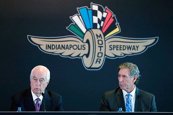 Penske Corporation chairman Roger Penske responds to a question Monday as Hulman & Co. chairman Tony Hulman George looks on during a news conference at Indianapolis Motor Speedway in Indianapolis.