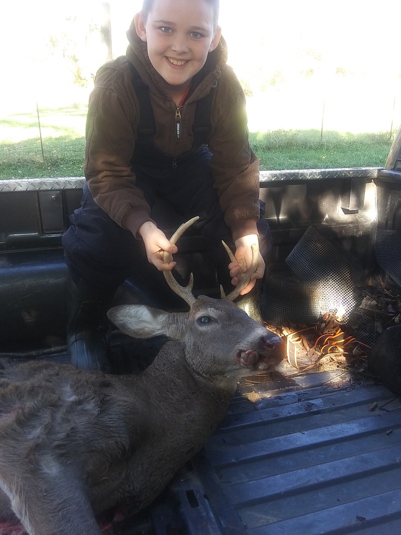 Zachary Bieri, of California, with his first deer, a 7-point buck, on Nov. 2, 2019. 