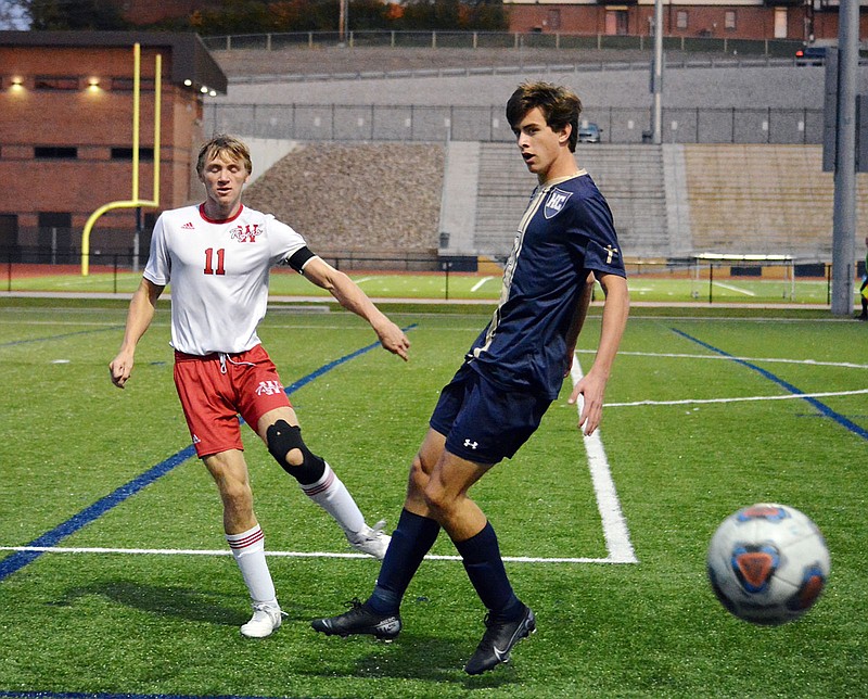 Luke Hynes of Helias runs to retrieve the ball after a thrown-in during Tuesday night's Class 3 District 9 Tournament game against Warrensburg at the Crusader Athletic Complex.