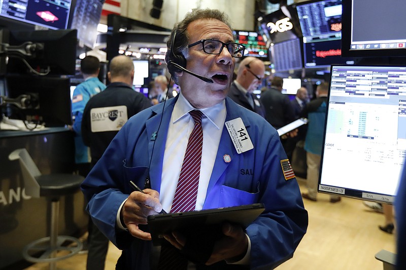 FILE - In this Oct. 30, 2019, file photo trader Sal Suarino works on the floor of the New York Stock Exchange. The U.S. stock market opens at 9:30 a.m. EST on Wednesday, Nov 6. (AP Photo/Richard Drew, File)