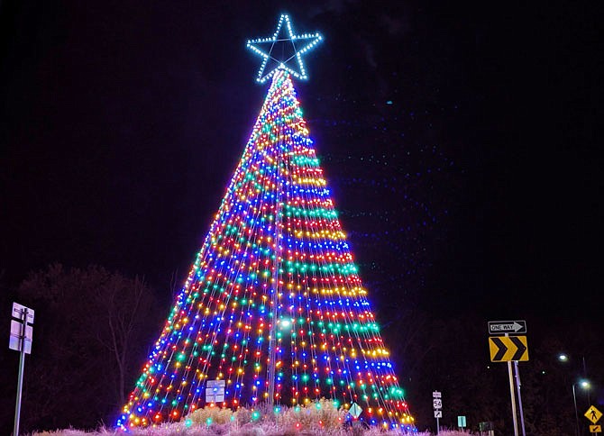 The City of Fulton's newest holiday decoration, a 45-foot-tall lighted "tree," turned on for the first time Tuesday evening. The decoration was crafted by city employees and locals, City Administrator Bill Johnson said.