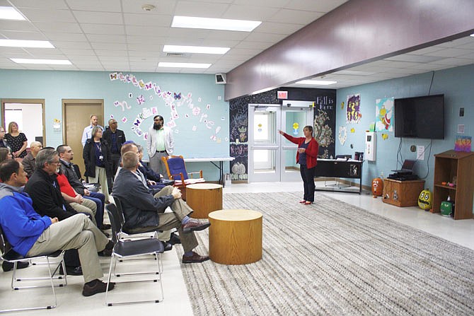 Shannon Kimsey, district administrator at the Fulton Women's Community Supervision Center, addresses the guests Wednesday at the center's open house. The center began operating in February and has a total of 42 beds.