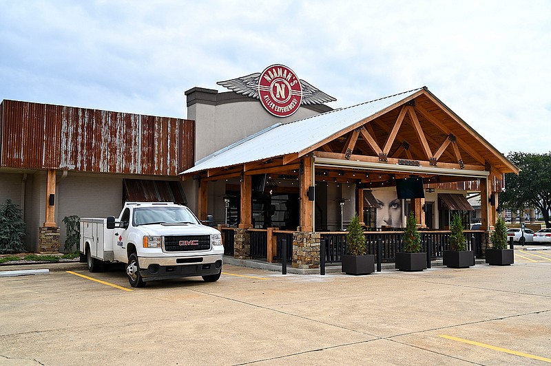 Naaman's moved to a new building across the street from the Texas side to the Arkansas side. The new location on North State Line Avenue is between Red Roof Inn and Villa Liquor Store Inc. The bigger location features an outdoor patio, bar and more seating for customers. 