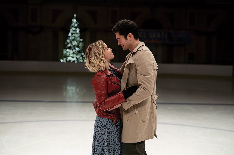 From left, Emilia Clarke and Henry Golding in the film "Last Christmas." (Jonathan Prime/Universal Pictures/TNS)