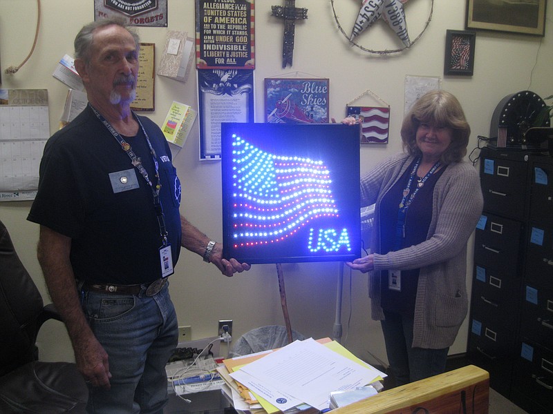 Ken Kunkel, left, and Cindy Watson at the Bowie County veterans office.