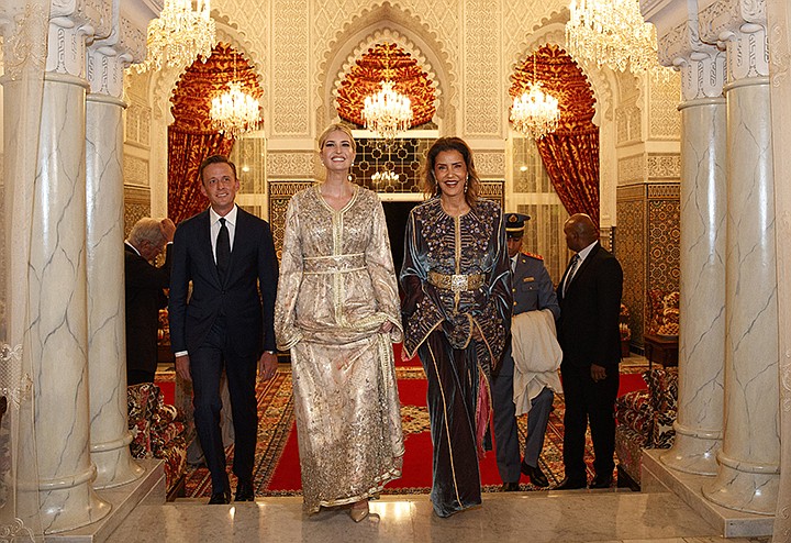 Wearing Moroccan caftans, Ivanka Trump, the daughter and senior adviser to President Donald Trump, and Princess Lalla Meryem of Morocco, right, Thursday, Nov. 7, 2019, walk to greet guests before a dinner at the Royal Guest House in Rabat, Morocco. At left of Trump is Sean Cairncross, CEO of the Millennium Challenge Corporation. (AP Photo/Jacquelyn Martin)