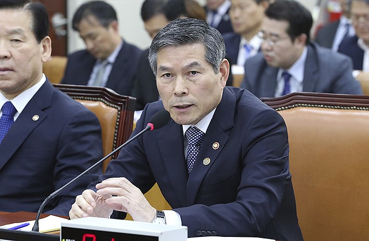 South Korean Defense Minister Jeong Kyeong-doo answers a lawmaker's question about  North Koreans' deportation during a defense committee meeting at the National Assembly in Seoul, South Korea, Thursday, Nov. 7, 2019. South Korea says it has deported 2 North Koreans after finding they had killed 16 fellow fishermen onboard and fled to South Korea. (Kim Ju-hyung/Yonhap via AP)