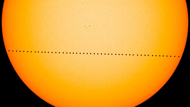 In this composite image provided by NASA, the planet Mercury passes directly between the sun and Earth on May 9, 2016 in a transit which lasted seven-and-a-half-hours. On Monday, Nov. 11, 2019, Mercury will make another transit, visible from the eastern U.S. and Canada, and all Central and South America. The rest of North America, Europe and Africa will catch part of the action. Asia and Australia will miss out. (NASA's Goddard Space Flight Center/SDO/Genna Duberstein via AP)