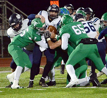 The Blair Oaks defense tackles Kaden Coffman of Salem during Friday night's game at the Falcon Athletic Complex in Wardsville.