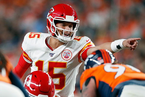 Chiefs quarterback Patrick Mahomes makes a call during the first half of a game last month against the Broncos in Denver. Mahomes, who was injured the game, is expected to get the start today for the Chiefs against the Titans in Nashville, Tenn.