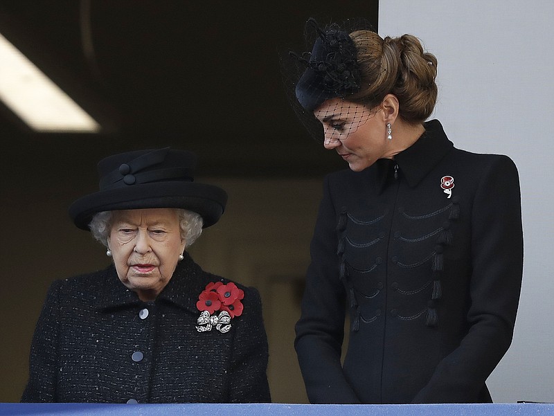 Britain's Queen Elizabeth II and Kate, Duchess of Cambridge attend the Remembrance Sunday ceremony at the Cenotaph in Whitehall in London, Sunday, Nov. 10, 2019. Remembrance Sunday is held each year to commemorate the service men and women who fought in past military conflicts. (AP Photo/Matt Dunham)