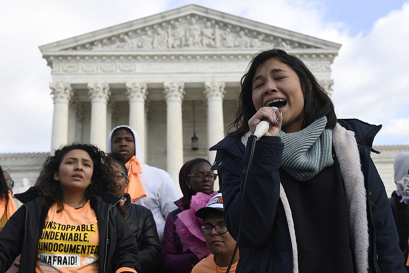 Michelle Lainez, 17, originally from El Salvador but now living in Gaithersburg, Md., speaks during a rally outside the Supreme Court in Washington, Friday, Nov. 8, 2019. The Supreme Court on Tuesday takes up the Trump administration’s plan to end legal protections that shield nearly 700,000 immigrants from deportation, in a case with strong political overtones amid the 2020 presidential election campaign. (AP Photo/Susan Walsh)