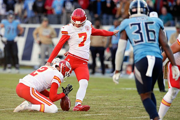 Chiefs kicker Harrison Butker boots a 39-yard field goal out of the hold of Dustin Colquitt during the second half of Sunday's game against the Titans in Nashville, Tenn.