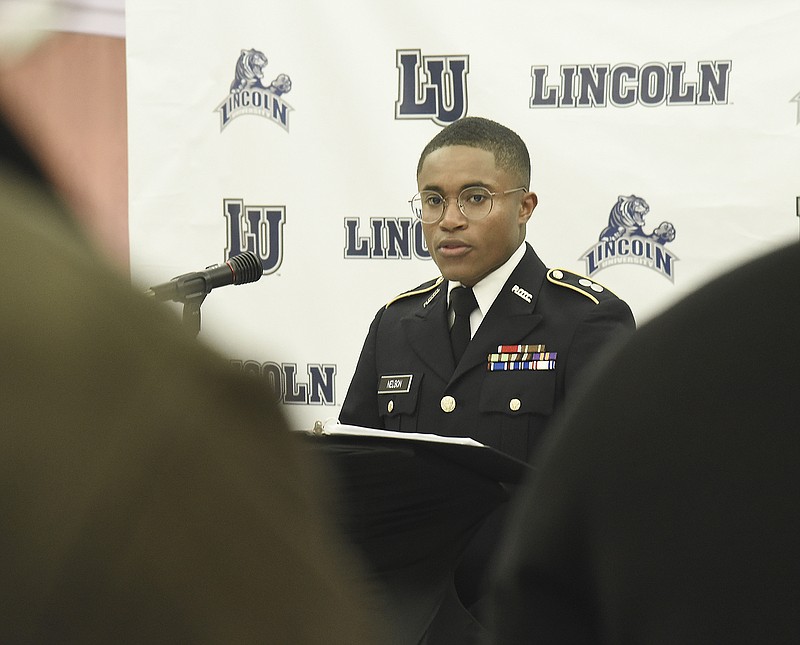 Lincoln University Blue Tiger Battalion ROTC Cadet Joshua Nelson delivers the benediction at the closing of a Veterans Day ceremony on the campus Monday. 