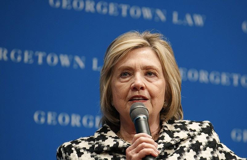 FILE - In this file photo dated Wednesday, Oct. 30, 2019, former U.S. Secretary of State Hillary Clinton speaks at Georgetown Law's second annual Ruth Bader Ginsburg Lecture, in Washington.  Clinton told the BBC on Tuesday Nov. 12, 2019, that she's “dumbfounded” the U.K. government has failed to release a report on Russian influence in British politics as the country prepares for national elections on Dec 12.  (AP Photo/Jacquelyn Martin, FILE)