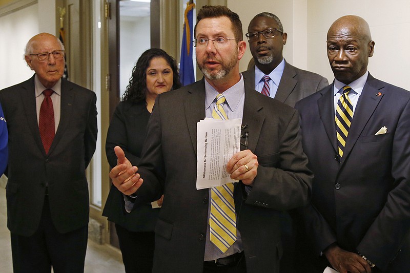 Former Republican House Speaker Kris Steele, the executive director of Oklahomans for Criminal Justice Reform, speaks after a group working to reduce Oklahoma's prison population launched an initiative petition that could lead to the release of hundreds more inmates, Tuesday, Nov. 12, 2019, in Oklahoma City. (AP Photo/Sue Ogrocki)