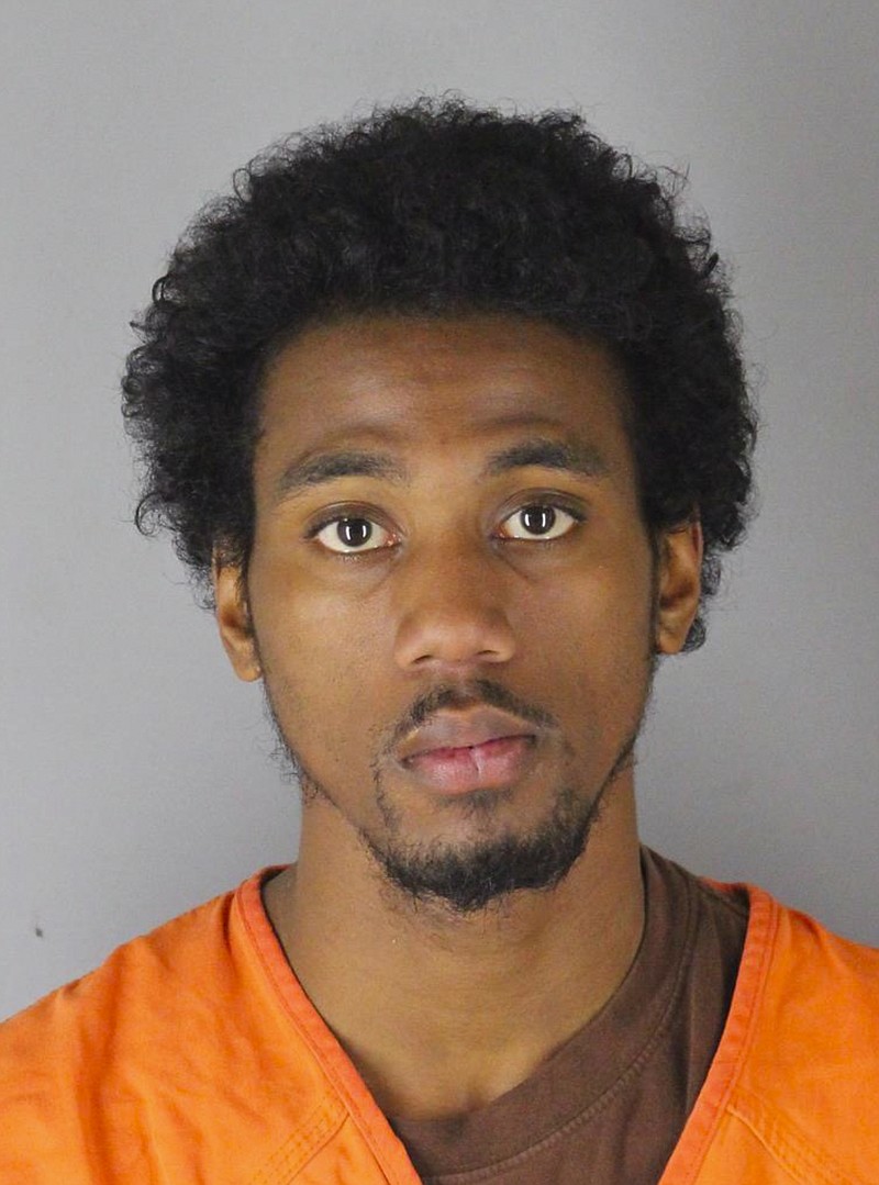 This booking photo released by the Minneapolis Police Department, shows Leroy Davis-Miles, 23,  accused of assaulting a 75-year-old man as he got off a Metro Transit bus but is now charged with murder after the victim died. Hennepin County prosecutors amended the charge against Davis-Miles to second-degree unintentional murder on Tuesday, Nov. 12, 2019. Originally he was charged with first-degree assault. (Minneapolis Police Department via AP)