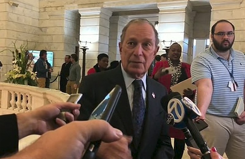 Former New York City Mayor Michael Bloomberg talks to the media after filing paperwork to appear on the ballot in Arkansas' March 3 presidential primary, Tuesday, Nov. 12, 2019 in Little Rock, Ark.   Bloomberg hasn't formally announced a bid for the Democratic presidential nomination, but his trip to Arkansas on Tuesday is the latest indication that he is leaning toward a run.  (AP Photo/APTN)