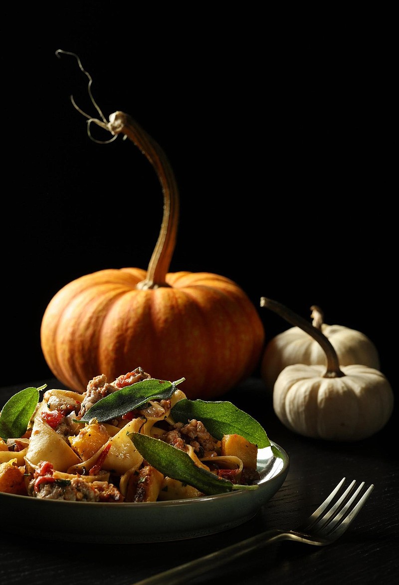 Fresh pumpkin is roasted for the pasta dish, then bolstered with a sausage and sage ragu. Styling by Shannon Kinsella. (Abel Uribe/Chicago Tribune/TNS) 