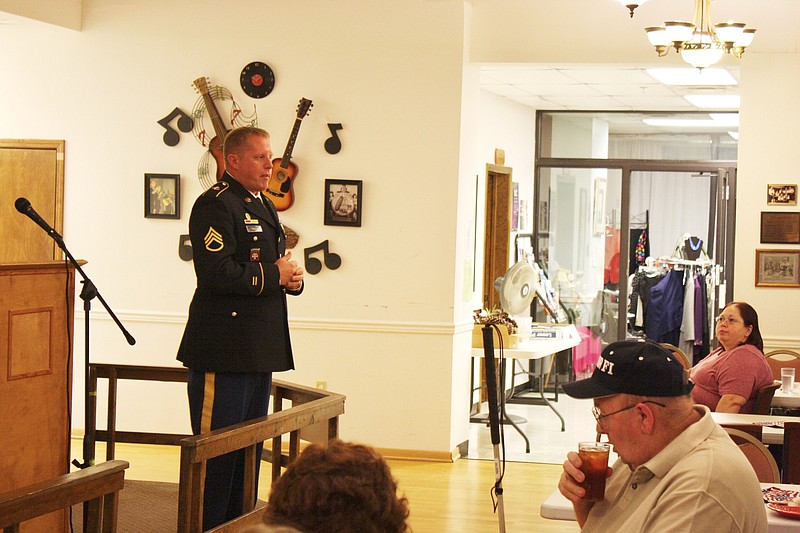 Staff Sgt. William Tharp speaks at Monday evening's Veterans Day Banquet at the Callaway Senior Center. A tradition since after World War II, the banquet consisted a Thanksgiving-style dinner, live music by Vonda Davis and an active duty guest speaker.