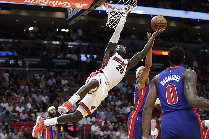 Miami Heat guard Kendrick Nunn (25) goes for the ball during the second half of an NBA basketball game against the Detroit Pistons, Tuesday, Nov. 12, 2019, in Miami. The Heat won 117-108. (AP Photo/Lynne Sladky)