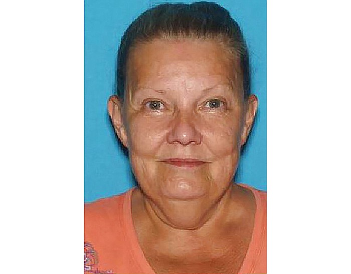 This undated photo provided by the Joplin, Mo., Police Department, shows Barbara Watters. Authorities are searching for Watters after finding her husband's corpse in a freezer inside her southwest Missouri home, where it may have been stored for nearly a year. Watters, 67, of Joplin, was charged Wednesday, Nov. 13, 2019, with abandonment of a corpse, a felony that is punishable by up to four years in prison. (Joplin Police Department via AP)