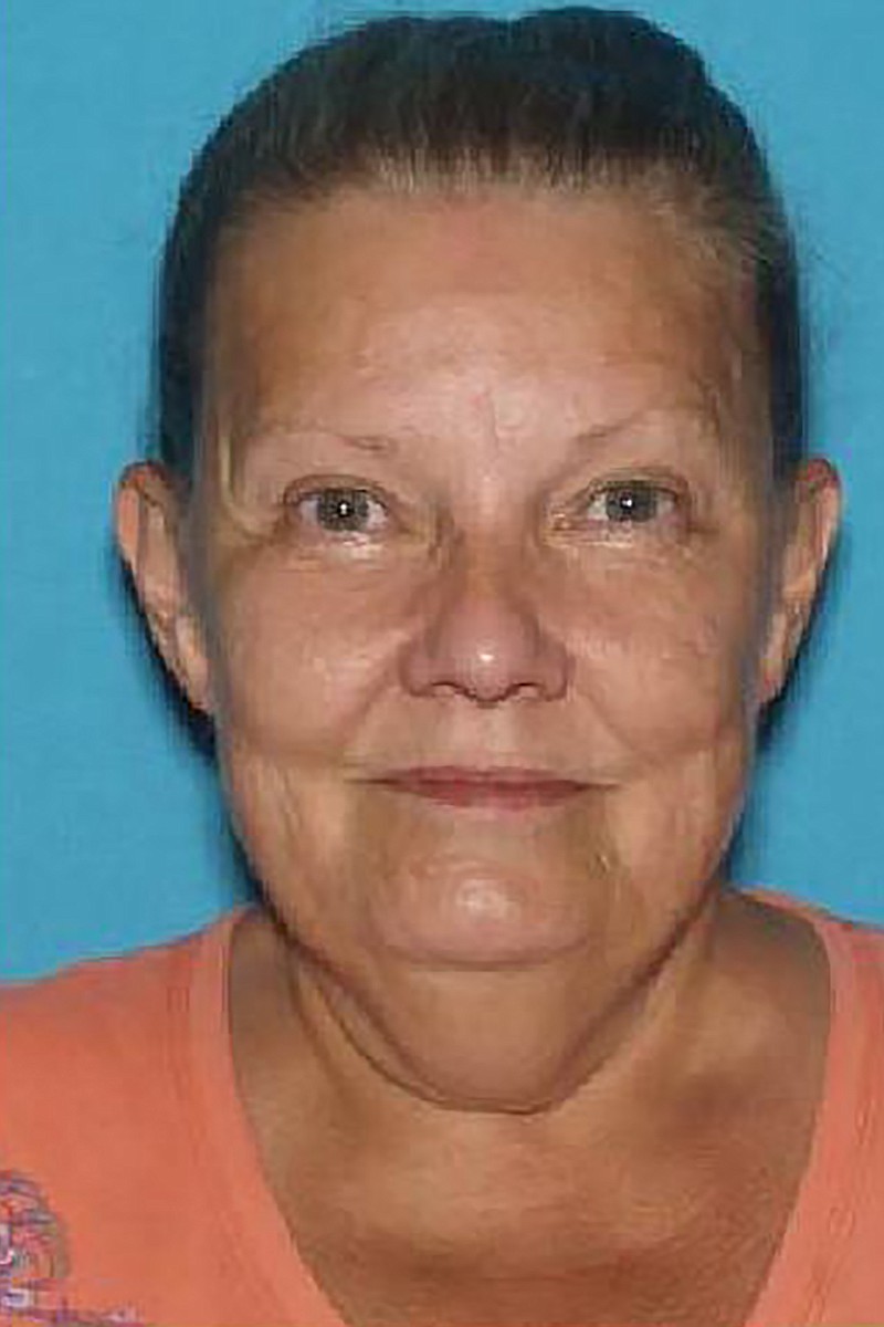 This undated photo provided by the Joplin, Mo., Police Department, shows Barbara Watters. Authorities are searching for Watters after finding her husband's corpse in a freezer inside her southwest Missouri home, where it may have been stored for nearly a year. Watters, 67, of Joplin, was charged Wednesday, Nov. 13, 2019, with abandonment of a corpse, a felony that is punishable by up to four years in prison. (Joplin Police Department via AP)