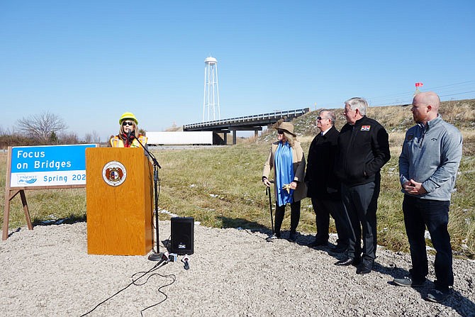 MoDOT Central District Engineer Michelle Watkins prepares to introduce Missouri politicians Sen. Jeanie Riddle, Rep. Kent Haden, Gov. Mike Parson and Rep. Travis Fitzwater. On Thursday, the group visited a Callaway County bridge slated for replacement in the coming year.